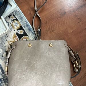 Tan Crossbody Bag with Structured Design and Metal Hardware